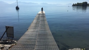 Jens for enden af broen. Et meget symbolsk billede, fordi denne tur til Schweiz i slutningen af september 2018 blev vores sidste, længere rejse sammen. Han var en dygtig hobbyfotograf og indfanger her stemningen ved Genève-søen. Privatfoto