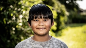 Den 10-årige dreng Wasuthon Nielsen - kaldet Guide - kom til Danmark for tre år siden fra Thailand. Men nu risikerer han at blive smidt ud af landet. Foto: Michael Svenningsen